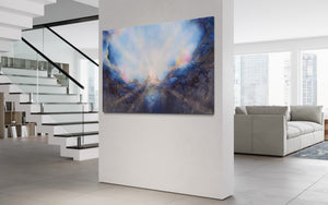Soul's Return, hanging on a wall in a modern home with white walls and glass encased staircase. a textured painting with light rays shining out from the center representing the soul's return to one's self, or the universe. Blue, pink, white, dark blue, textured painting. Ephemeral art, art with meaning, soul artist. Jennifer Tepper Fine Art.