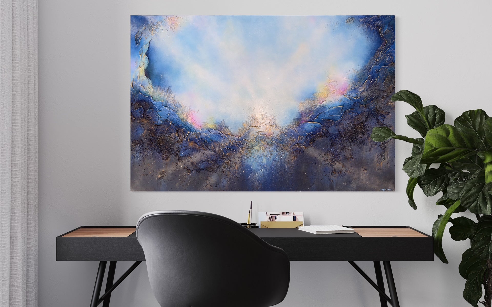 Soul's Return, hanging over a desk with modern chair and deep green plants. a textured painting with light rays shining out from the center representing the soul's return to one's self, or the universe. Blue, pink, white, dark blue, textured painting. Ephemeral art, art with meaning, soul artist. Jennifer Tepper Fine Art.